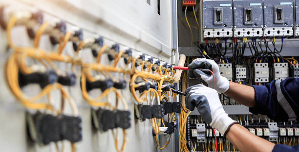 Professional Electrician technician working in Ballwin, MO